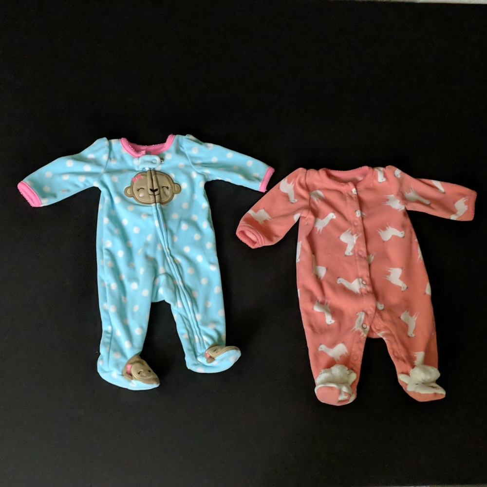 2 Newborn Onesies.  Gently worn. ☺️